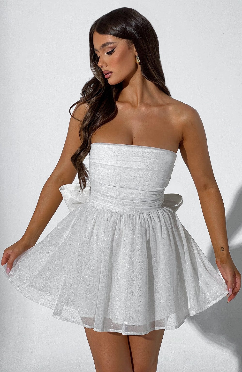 The Timeless Allure of the Glitter Mini Dress